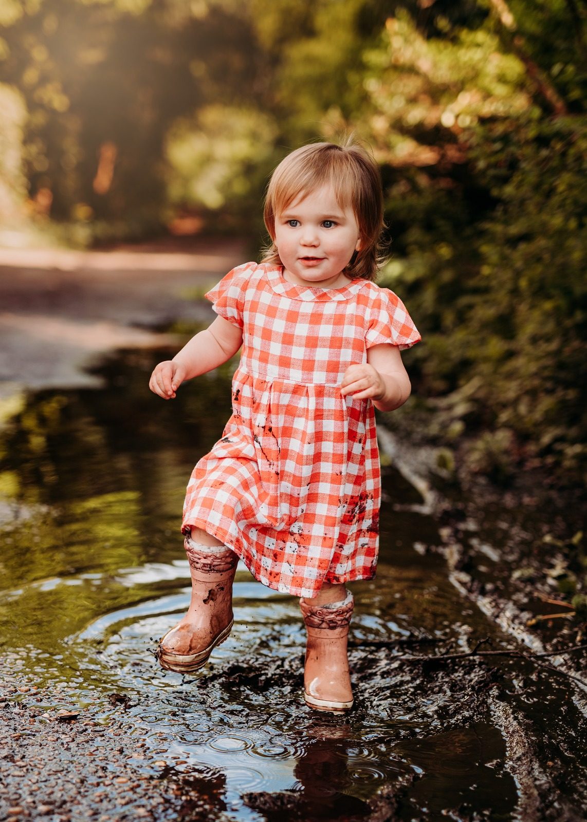Little Explorers session - a child playing and exploring during an outdoor photography session